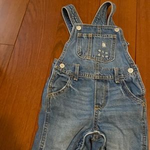 Toddler girl’s denim overalls